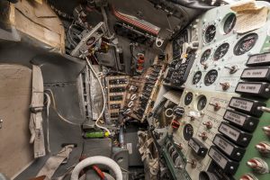 View of the cockpit and instrument panels inside the Mercury Friendship 7 spacecraft